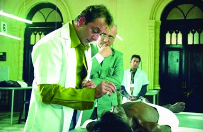 The Munna Bhai MBBS film was not released when we were studying human anatomy. However, this photo of the anatomy dissection hall provides a lively depiction of the hall's activity. Murali Prasad Sharma character of the Munna Bhai MBBS film (Sanjay Dutt) holds the scalpel in his hand like a knife. Doctor Asthana (Boman Irani) instructs him to hold the 'scalpel' like a 'pen'. Medical student Murali Prasad Sharma (Sanjay Dutt) gets dizzy and falls down. I had seen a few medical students getting dizzy and falling down after seeing the naked bodies for the first time.